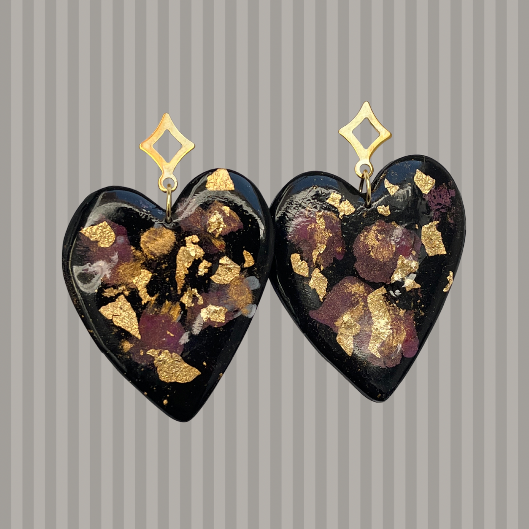 Corazón grande negro.