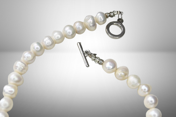 Collar de perlas cruz